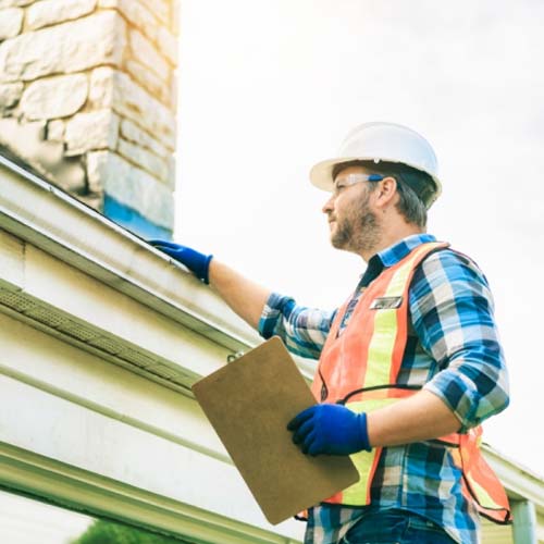 Rep Inspecting Roof